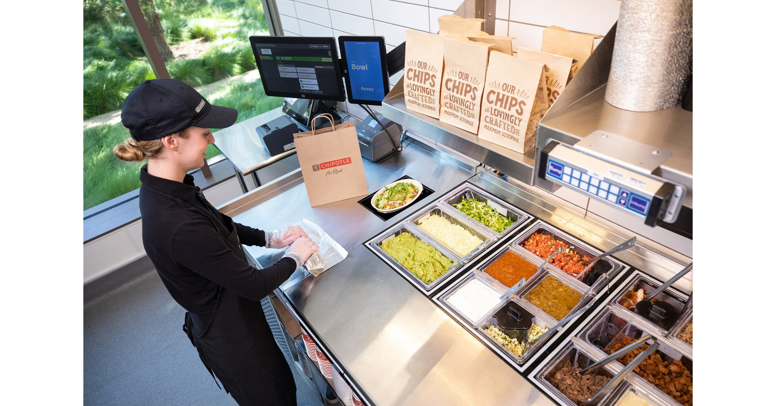 Chipotle team member working alongside Hyphen makeline